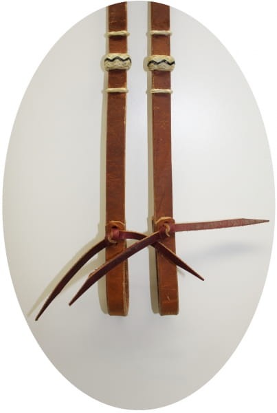 Ozdobne tulejki z surowej skóry rawhide na wodzach romal — HorsePassion.pl