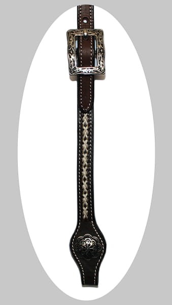 Policzek ogłowia western futurity — srebrna klamra arabeska u góry, biała plecionka wzdłuż paska, Spanish-cut końcówka z concho kwiatową — HorsePassion.pl