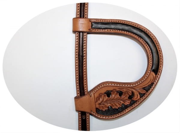 Detal pętli usznej Equi SHOW — kształtowana, oak leaf tooling na tan, czarny fakturowany inlay, skórzana linka