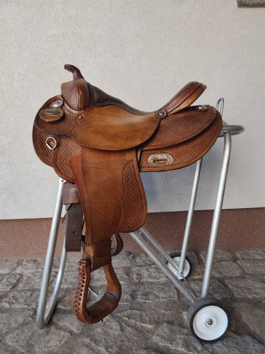 Używane siodło western Continental Saddlery 184 16" — basket tooling, mieszane okucia, widok z boku