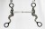 Czanka Snaffle Bit Flower 5" — widok frontalny, symetryczne czarne czanki z grawerem floral scrollwork na obu stronach, O-ringi górne, teardrop dolne